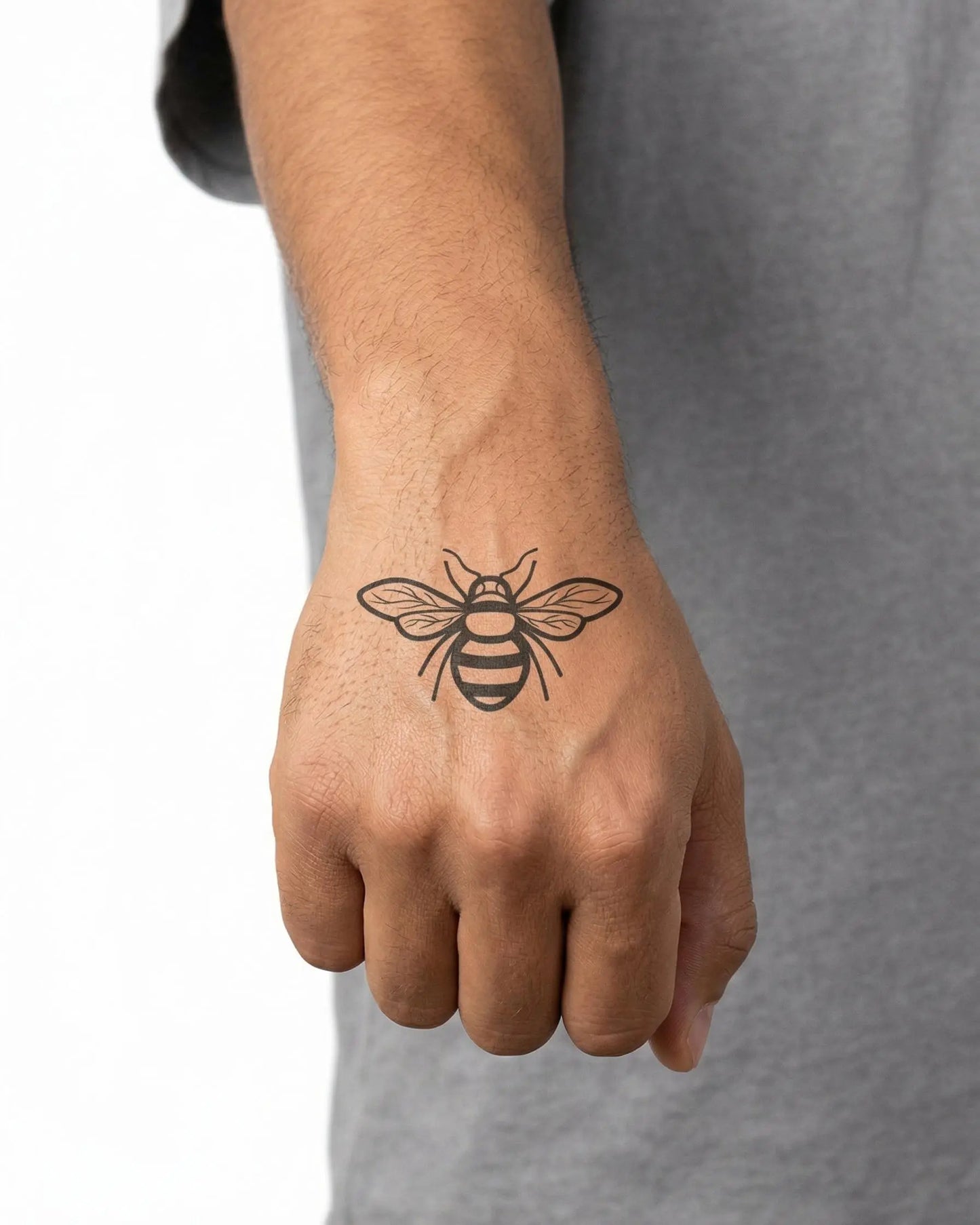INKON Honeybee 2 semi-permanent tattoo applied on a man – 2 x 2 in (5x5cm) design, realistic ink look, lasts 10 days