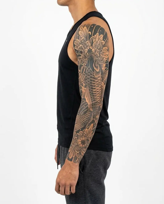 INKON Koi Fish & Chrysanthemum Sleeve semi-permanent tattoo applied on a man – 8 x 20 in (20x50cm) design, realistic ink look, lasts 10 days