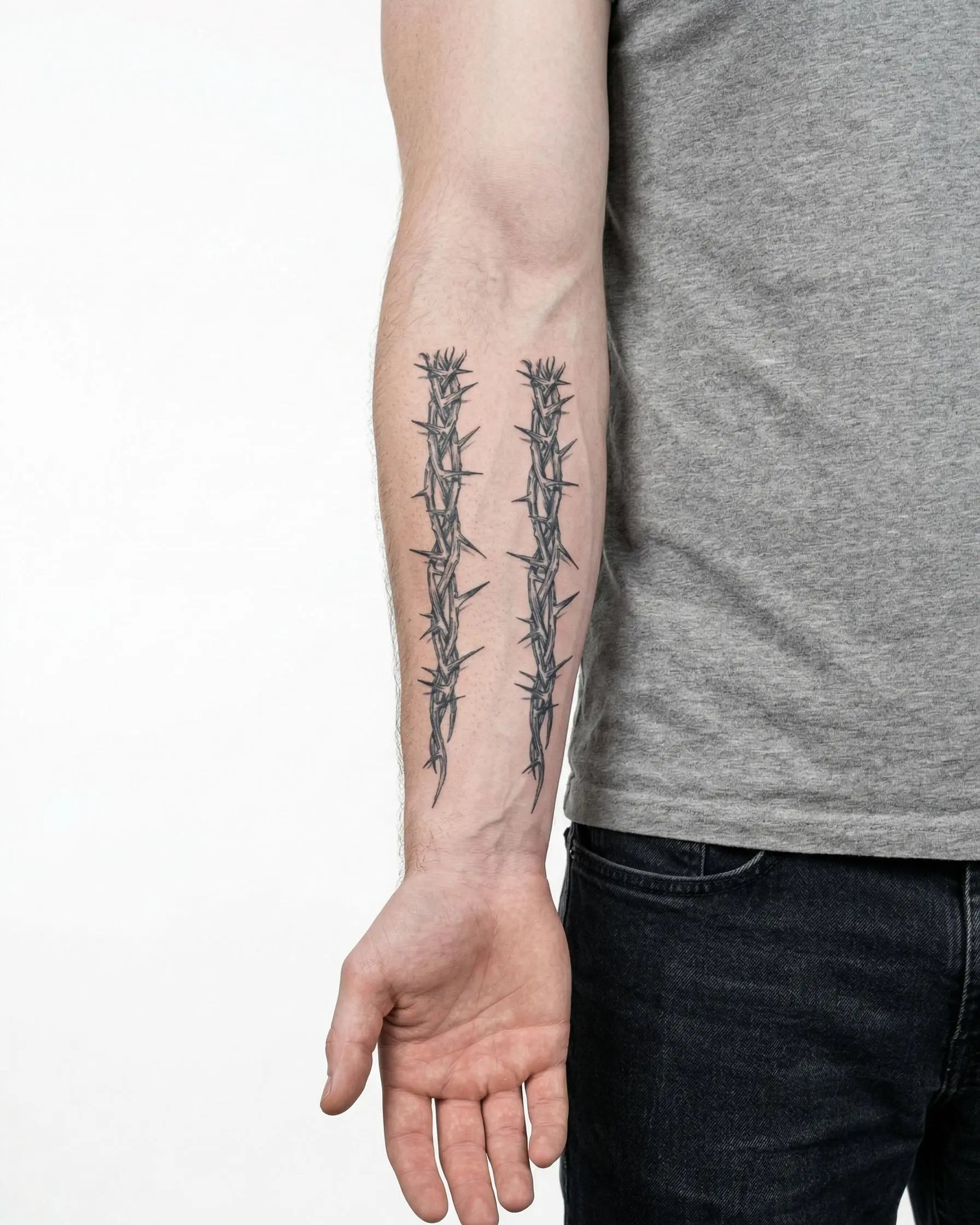 INKON Thorn Vines semi-permanent tattoo applied on a man – 4 x 8 in (11x21cm) design, realistic ink look, lasts 10 days