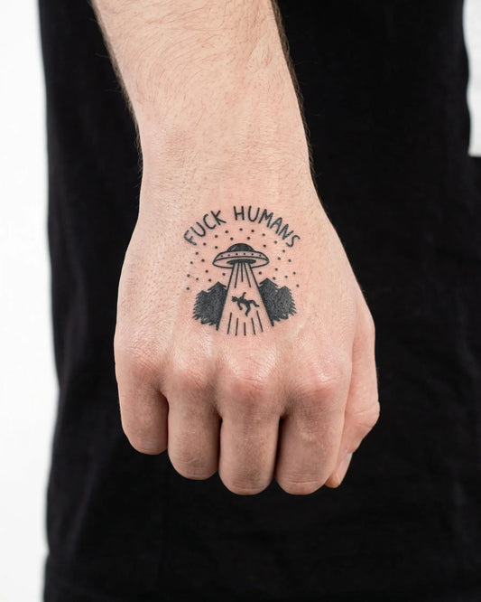 INKON UFO Abduction semi-permanent tattoo applied on a man – 2 x 2 in (5x5cm) design, realistic ink look, lasts 10 days