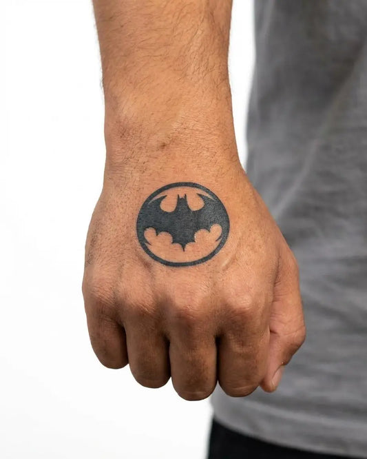 INKON Bat Signal semi-permanent tattoo applied on a man – 2 x 2 in (5x5cm) design, realistic ink look, lasts 10 days