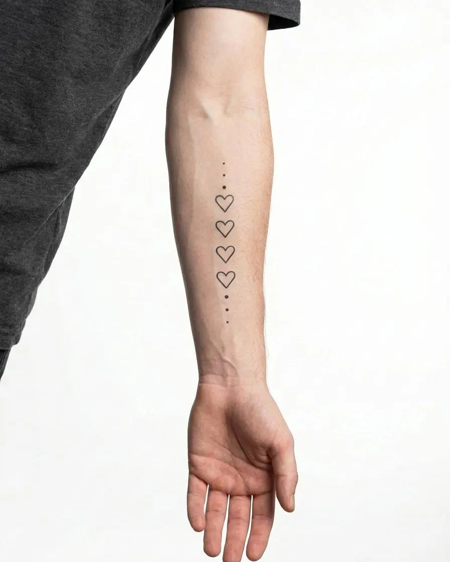 INKON Hearts & Dots Chain semi-permanent tattoo applied on a man – 4 x 7 in (10x17cm) design, realistic ink look, lasts 10 days