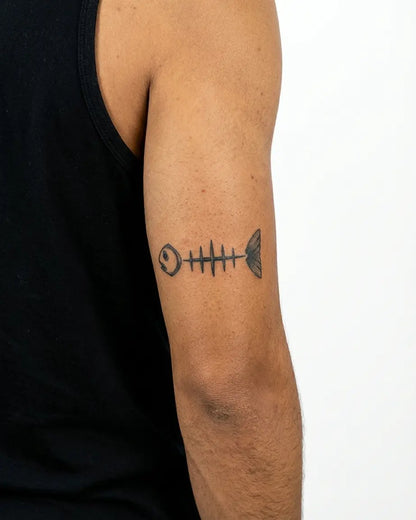 INKON Minimalist Fish Skeleton semi-permanent tattoo applied on a man – 3 x 4 in (6x11cm) design, realistic ink look, lasts 10 days