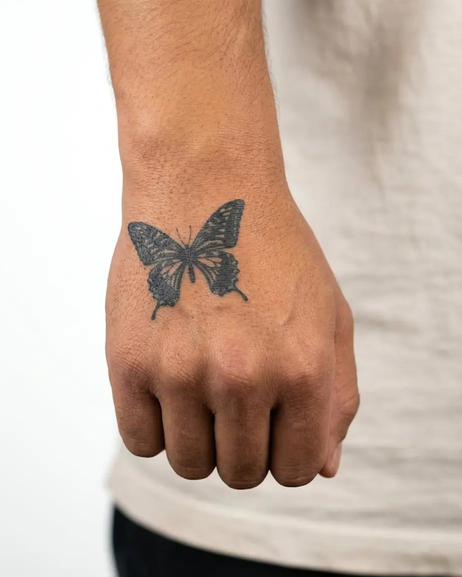 INKON Swallowtail Butterfly semi-permanent tattoo applied on a man – 2 x 2 in (5x5cm) design, realistic ink look, lasts 10 days