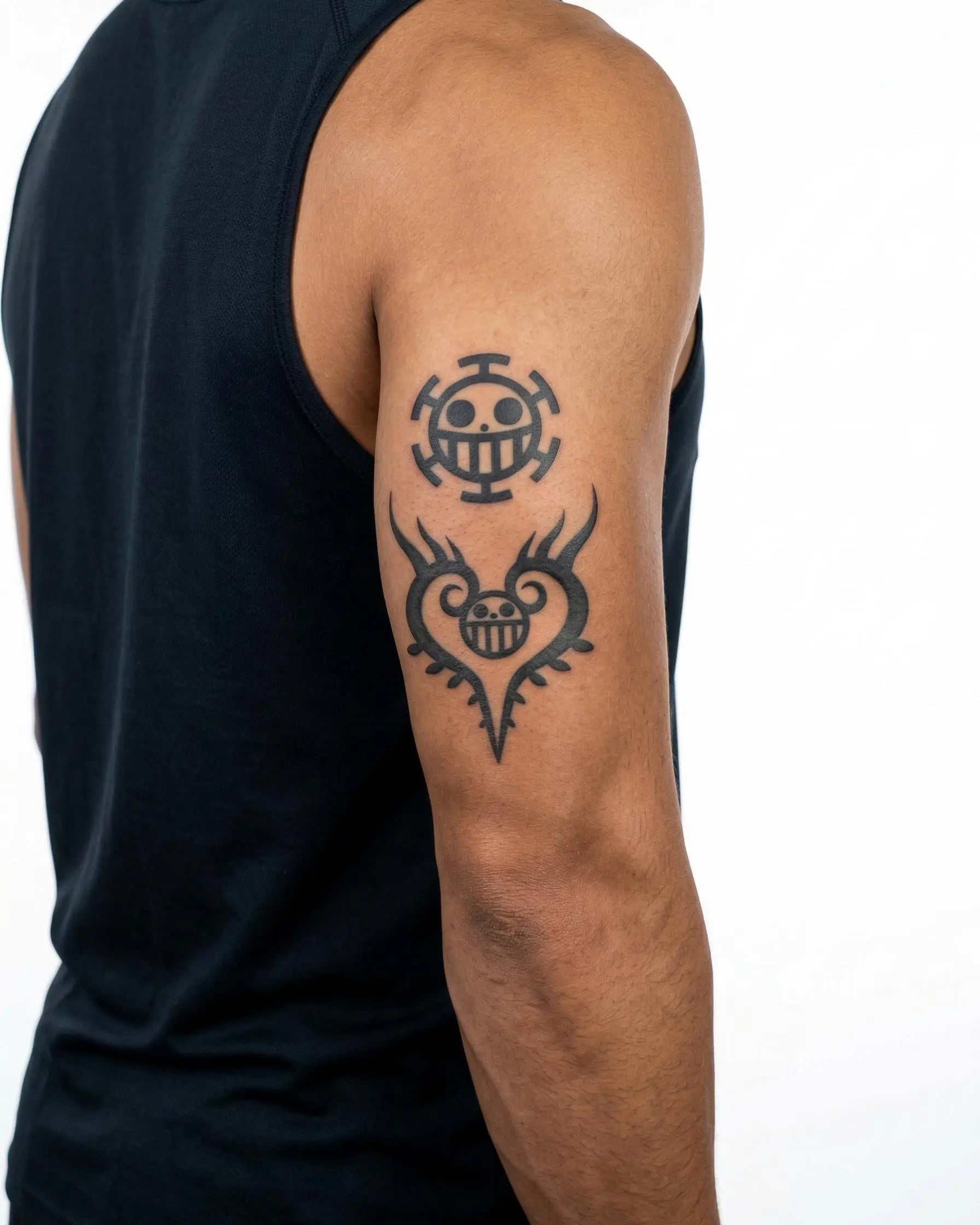 INKON Pirate Skull Emblems semi-permanent tattoo applied on a man – 4 x 7 in (10x17cm) design, realistic ink look, lasts 10 days