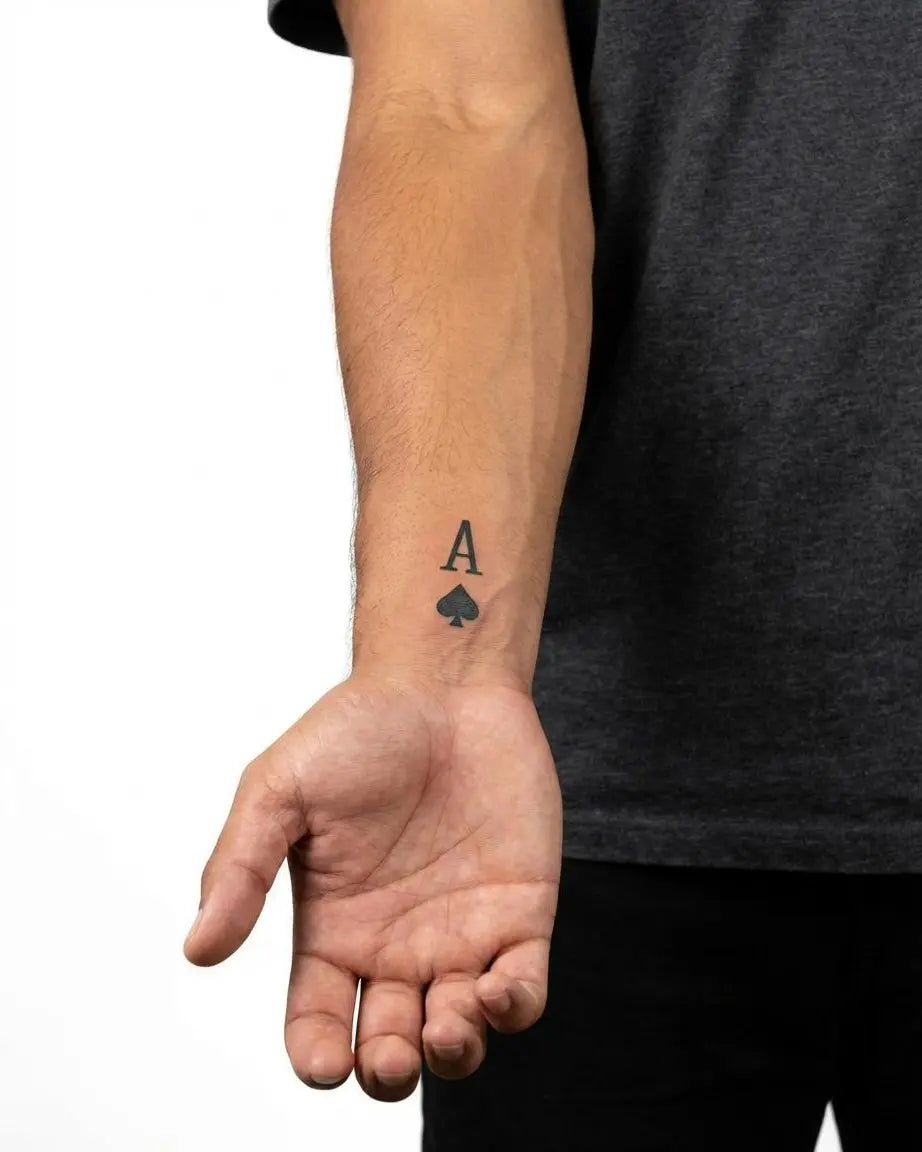 INKON Ace of Spades semi-permanent tattoo applied on a man – 2 x 2 in (5x5cm) design, realistic ink look, lasts 10 days