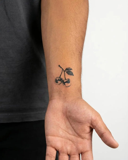 INKON Cherries semi-permanent tattoo applied on a man – 2 x 2 in (5x5cm) design, realistic ink look, lasts 10 days