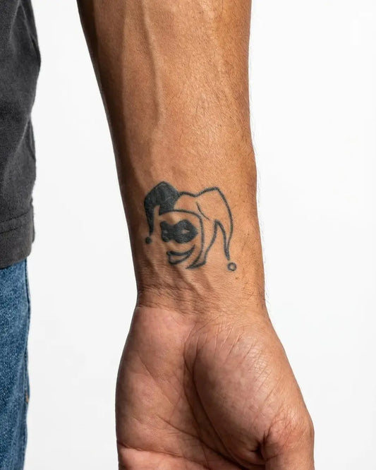 INKON Jester Face semi-permanent tattoo applied on a man – 2 x 2 in (5x5cm) design, realistic ink look, lasts 10 days