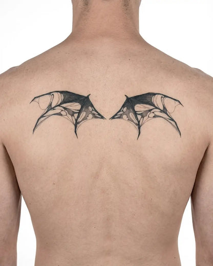 INKON Tattered Demon Wings semi-permanent tattoo applied on a man – 4 x 8 in (11x21cm) design, realistic ink look, lasts 10 days