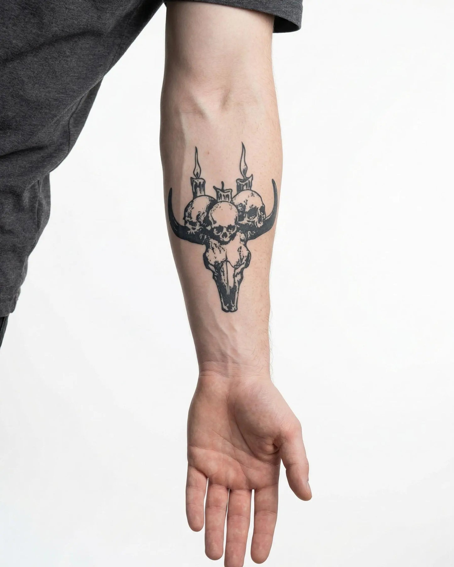 INKON Bull Skull & Candles semi-permanent tattoo applied on a man – 4 x 4 in (9x9cm) design, realistic ink look, lasts 10 days