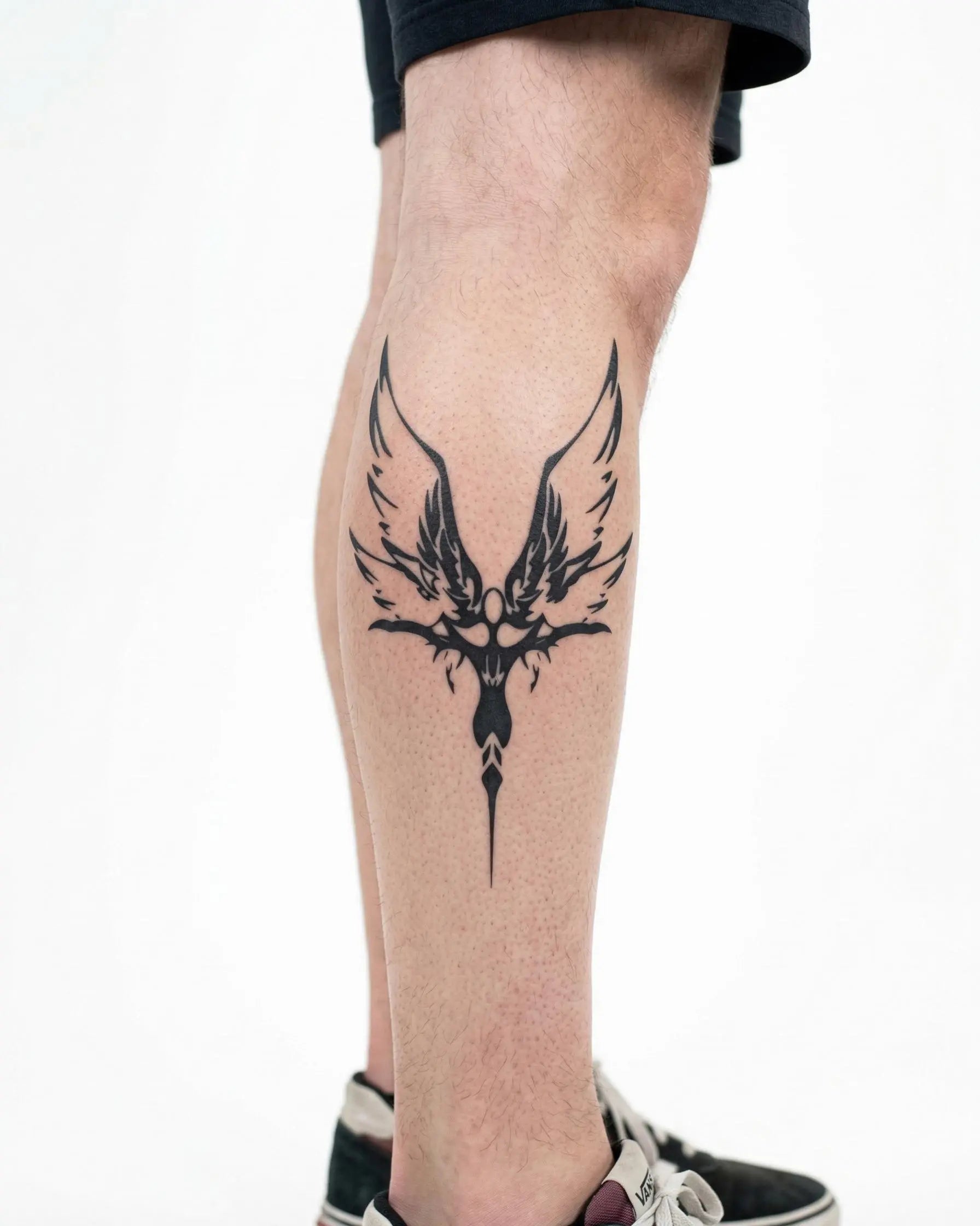 INKON Tribal Phoenix semi-permanent tattoo applied on a man – 4 x 7 in (10x17cm) design, realistic ink look, lasts 10 days