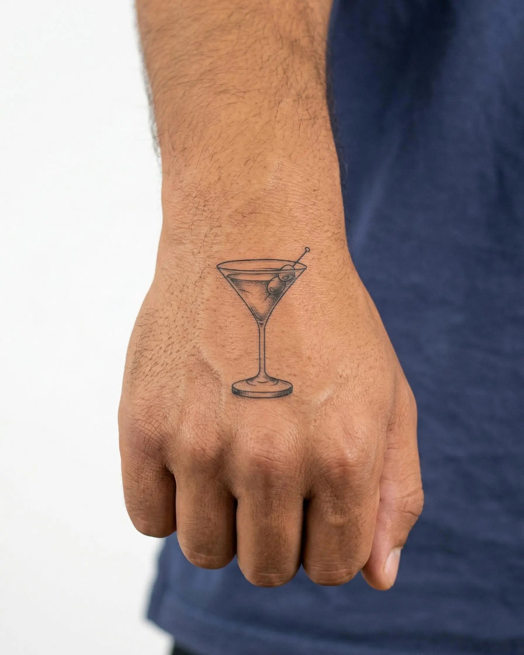 INKON Martini Glass semi-permanent tattoo applied on a man – 2 x 2 in (5x5cm) design, realistic ink look, lasts 10 days