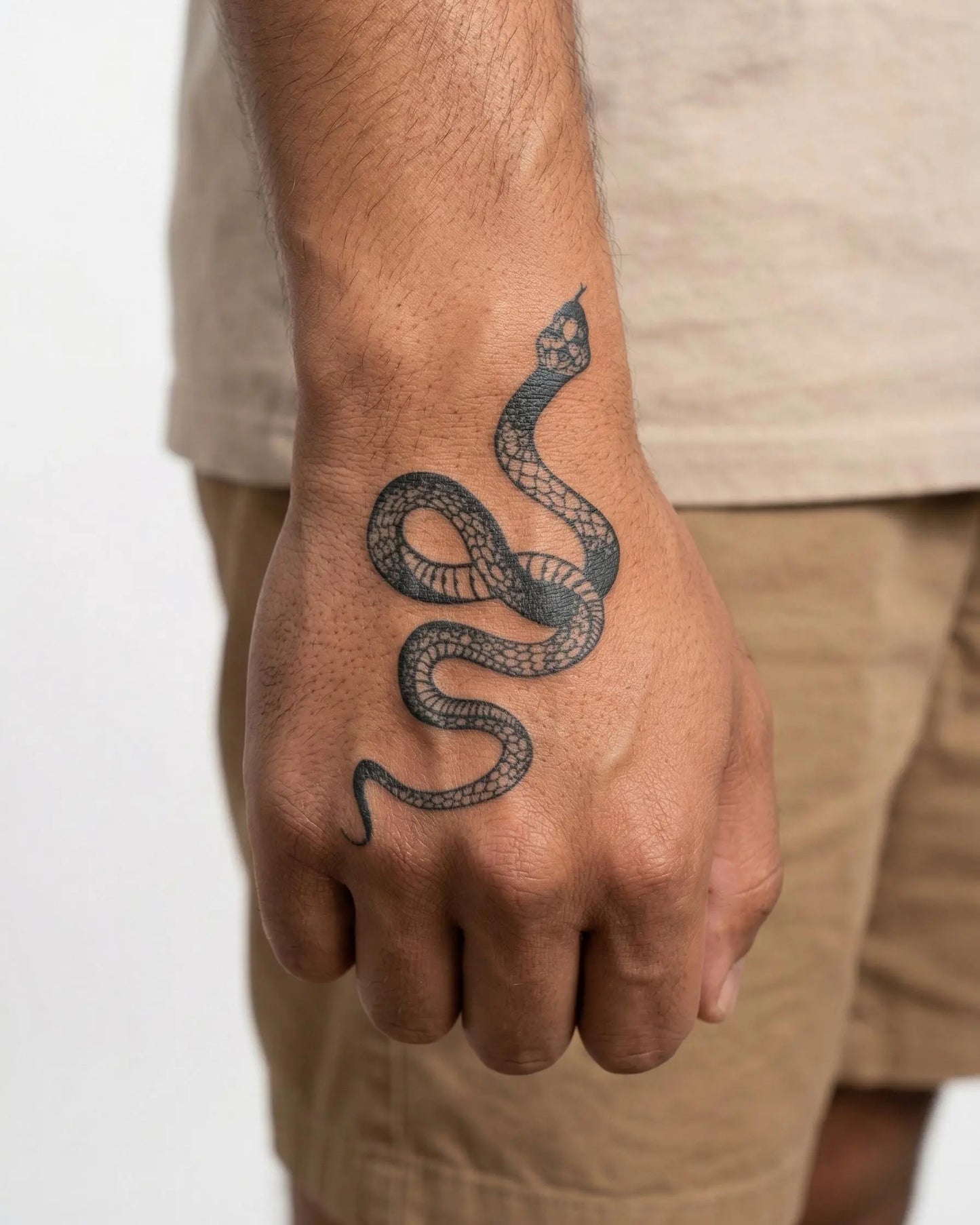 INKON Serpent semi-permanent tattoo applied on a man – 2 x 5 in (5x10cm) design, realistic ink look, lasts 10 days