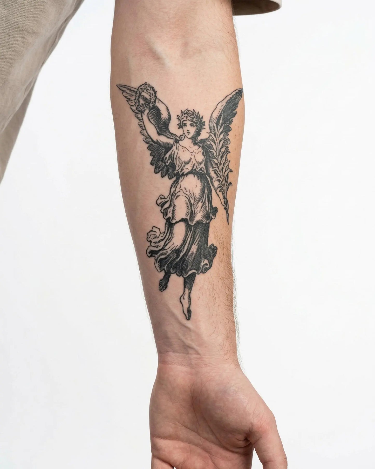 INKON Victory Angel semi-permanent tattoo applied on a man – 4 x 7 in (10x17cm) design, realistic ink look, lasts 10 days