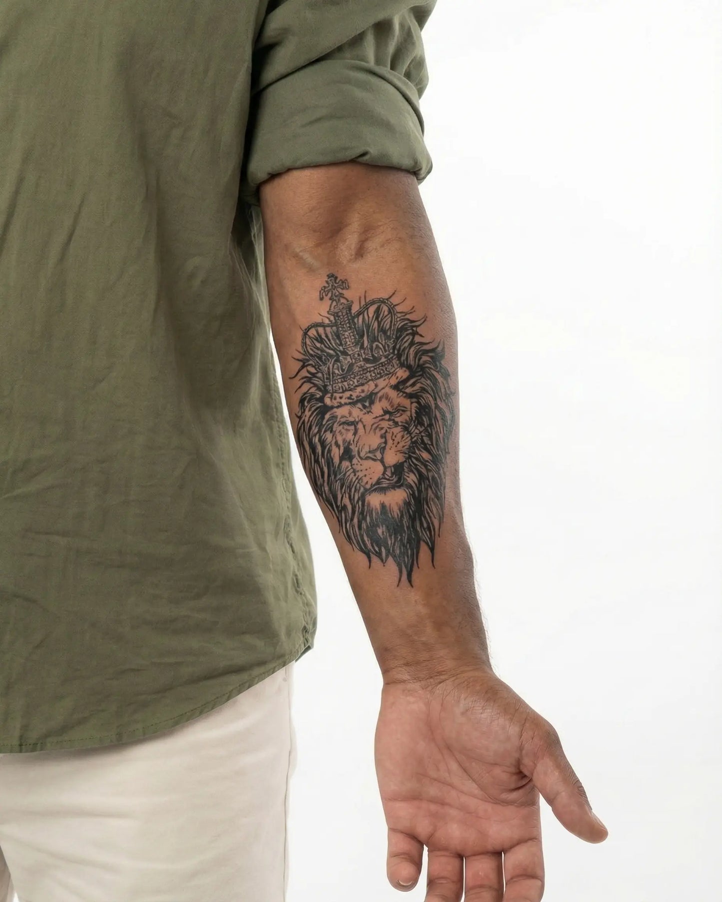 INKON Lion King Crown semi-permanent tattoo applied on a man – 4 x 7 in (10x17cm) design, realistic ink look, lasts 10 days