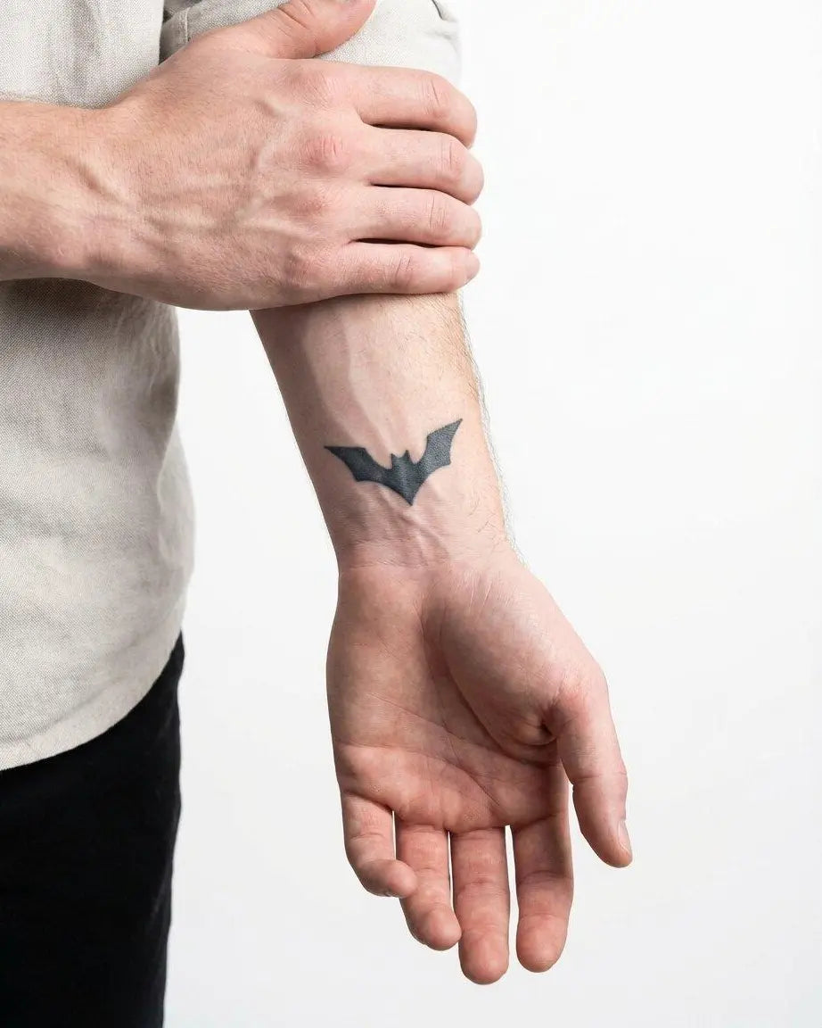 INKON Bat Silhouette semi-permanent tattoo applied on a man – 2 x 2 in (5x5cm) design, realistic ink look, lasts 10 days