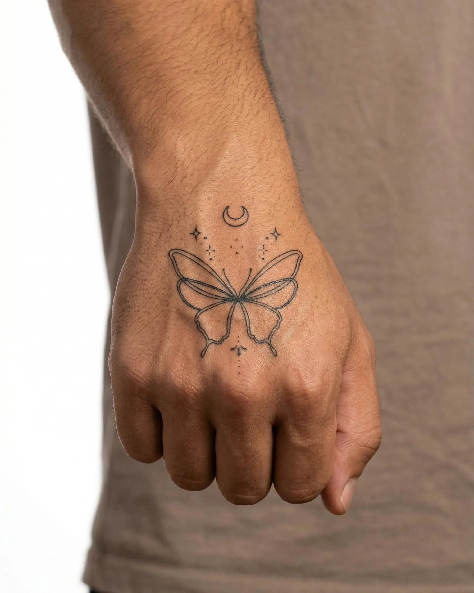 INKON Celestial Butterfly semi-permanent tattoo applied on a man – 2 x 2 in (5x5cm) design, realistic ink look, lasts 10 days