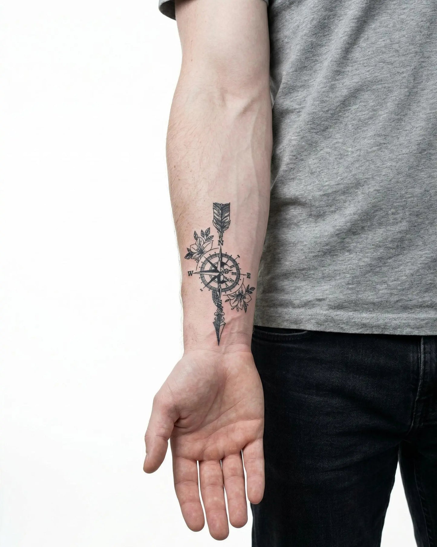 INKON Floral Compass & Arrow semi-permanent tattoo applied on a man – 3 x 4 in (6x11cm) design, realistic ink look, lasts 10 days