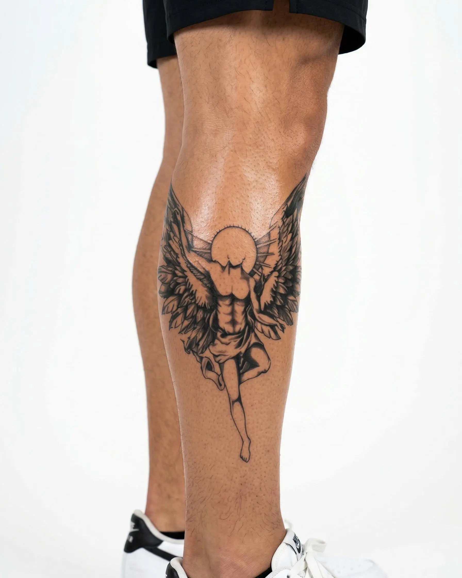 INKON Guardian Angel semi-permanent tattoo applied on a man – 4 x 8 in (11x21cm) design, realistic ink look, lasts 10 days
